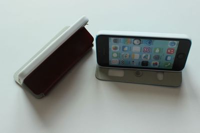 IPHONE 5C 雙開(kāi)窗支撐電壓帶鉆皮套 功能、特色與市場(chǎng)價(jià)值